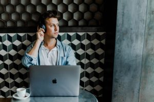 man-laptop-headset